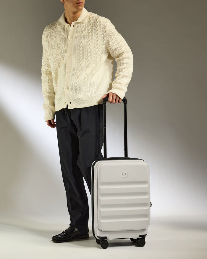 a man holding a suitcase