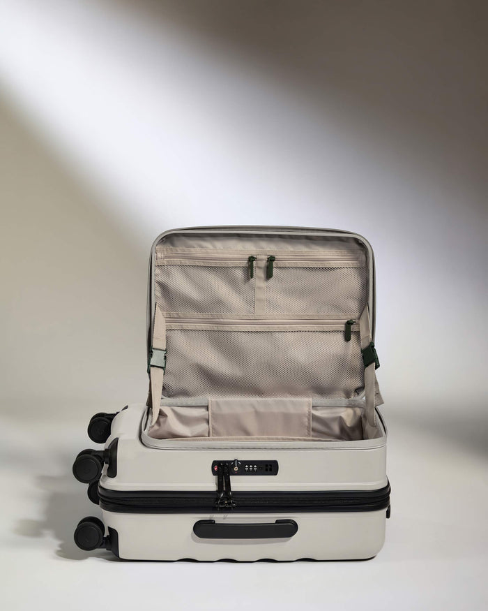 a suitcase with wheels and a light shining on it