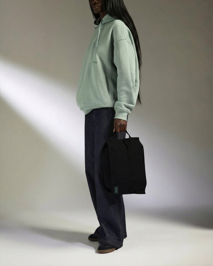a man holding a bag