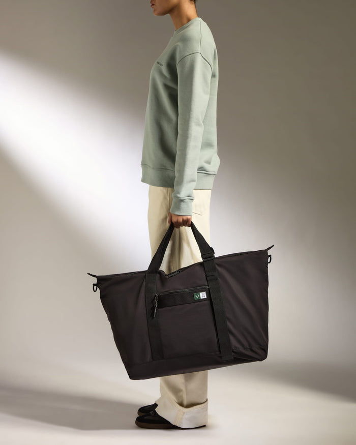 a woman holding a bag