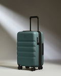 a blue suitcase with wheels