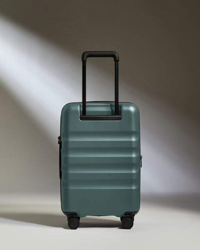 a suitcase with wheels and handle