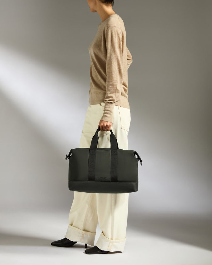 a woman holding a bag
