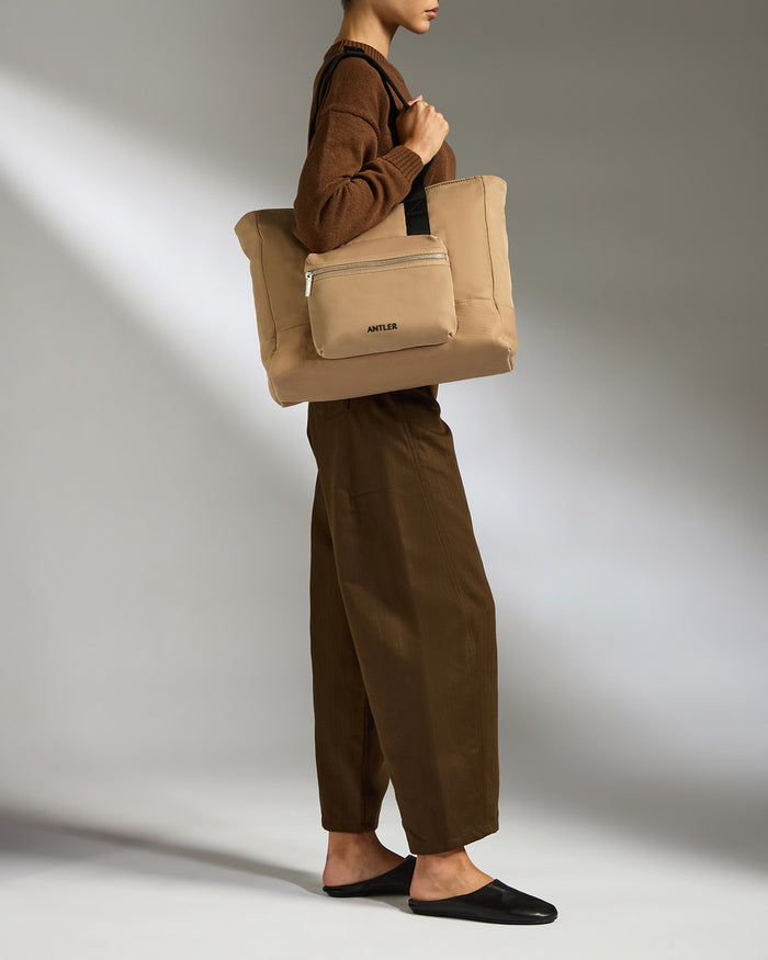 a woman holding a bag